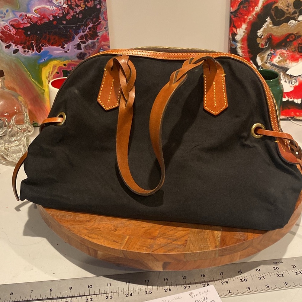 Dooney and Bourke vintage Black canvas nylon and Tan Leather Handbag M0019821